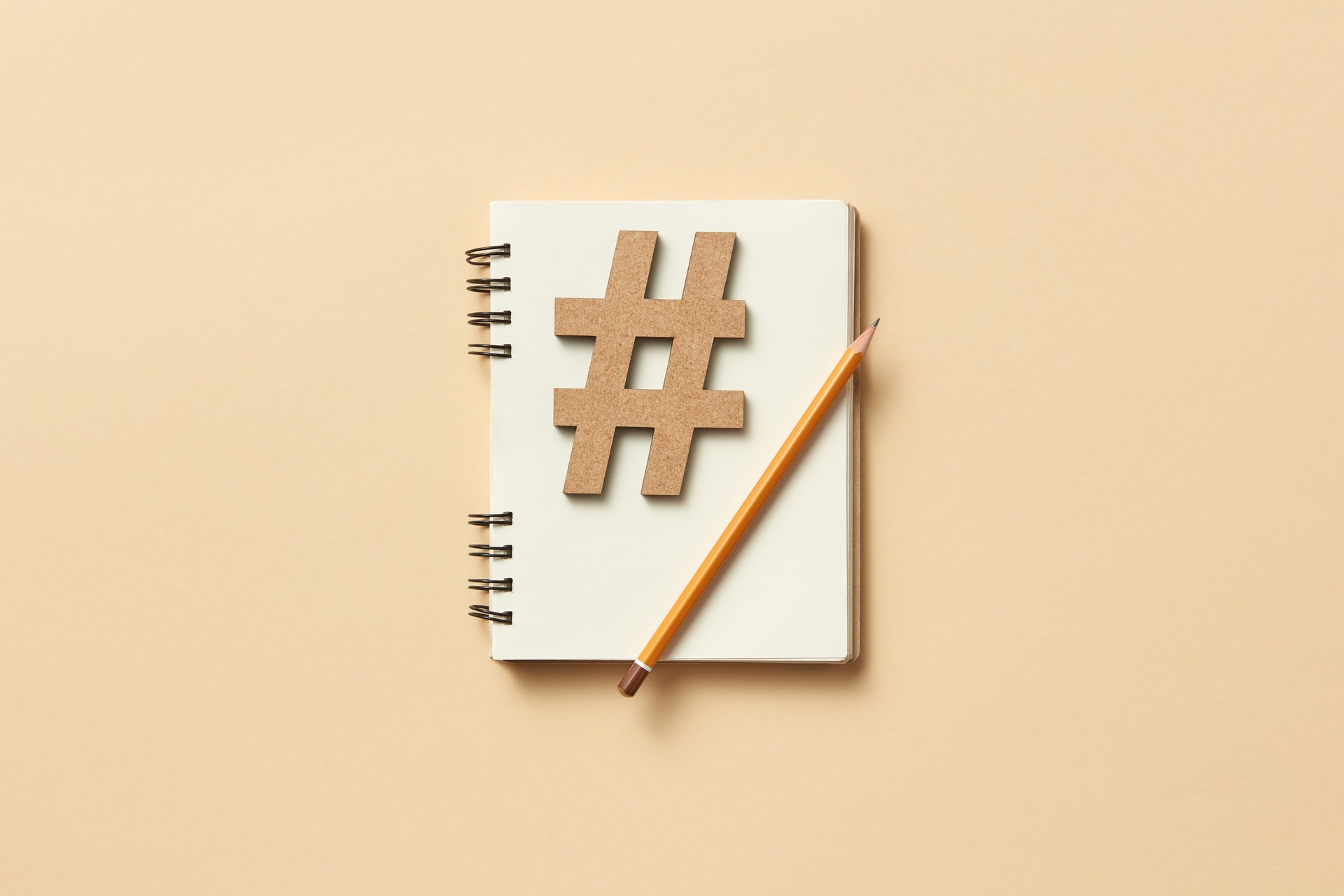 Image of hashtag on a notebook.