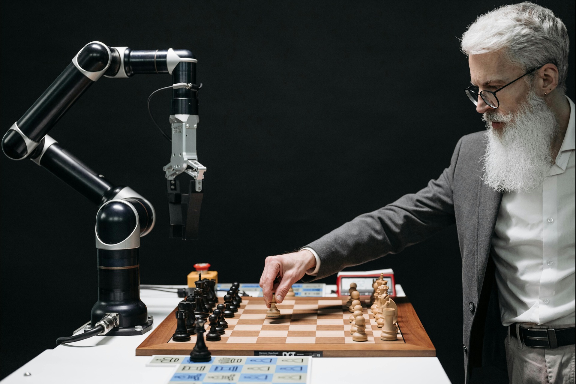 A Bearded Man Playing Chess with AI robot